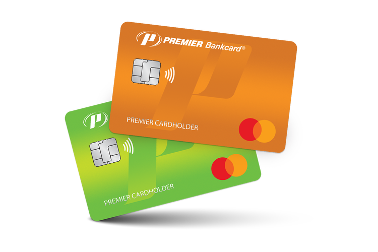 orange credit card stacked on top of lime green credit card