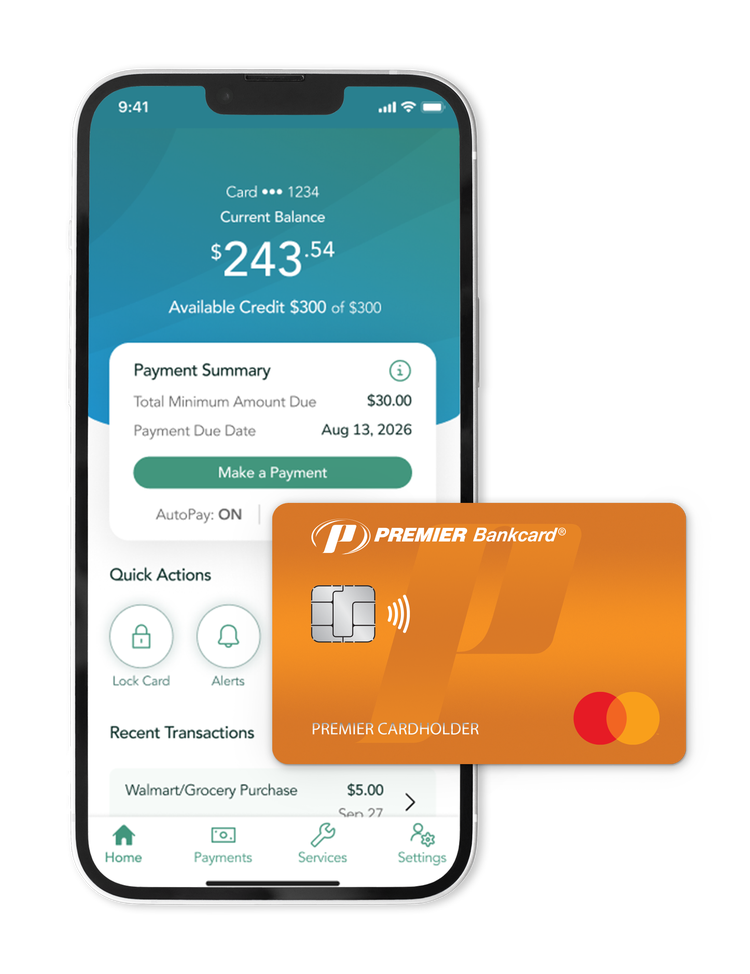orange credit card and mobile phone with mobile app